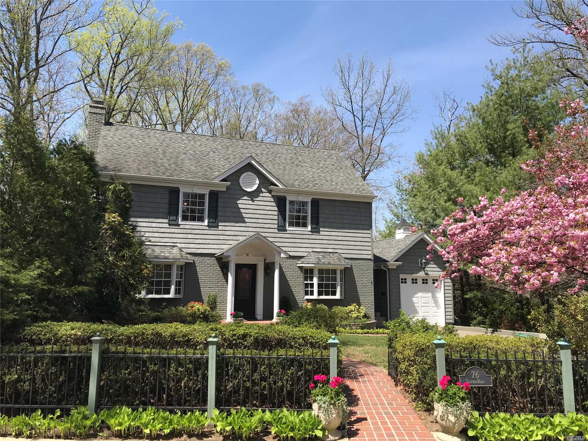 Beautifully Renovated Great Neck Center-Hall Colonial With Wonderful Curb Appeal  This Four Bedroom Home Features Stunning Master Bedroom Suite With Elegant Bathroom And Dressing Room/Office/Nursery On Main Level And Three Large Bedrooms And Over-Sized Bathroom On Second Level. Main Level Has Flexible Floor Plan With Gracious Living Room With F/P, Formal Dining Room, Family Room, Guest Bath And Custom Eat-In Kitchen With Skylight And Deck Access. Home Incorporates Traditional Detail