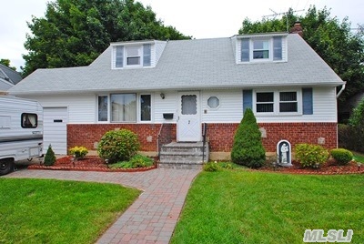 Desirable West Farmingdale.Very Large Open, Treed. Property, Your Own Park.Expanded, Spacious Cape Cod Home.