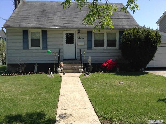 Lovely Cape In The Arlyn Oaks Neighborhood. House Being Sold As In Condition,  The Back Yard Is 69 Feet At It Widths. Buyer Should Re-Verify All Information.