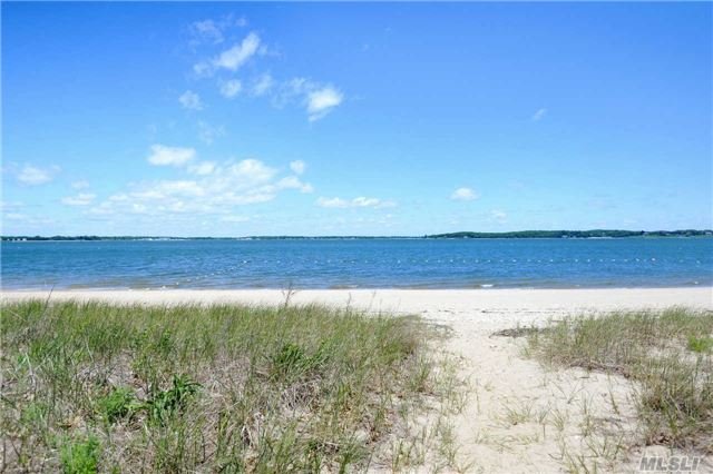 Spacious Beach Cottage In Reydon Shores Of Southold, With Beautiful Beach And Association Docking Rights. 5 Bedrooms, 3 Baths, Living Room With Fireplace, Kitchen, Office, Enclosed Porch And Detached 1 Car Garage. Water Views From Second Floor Of Home.