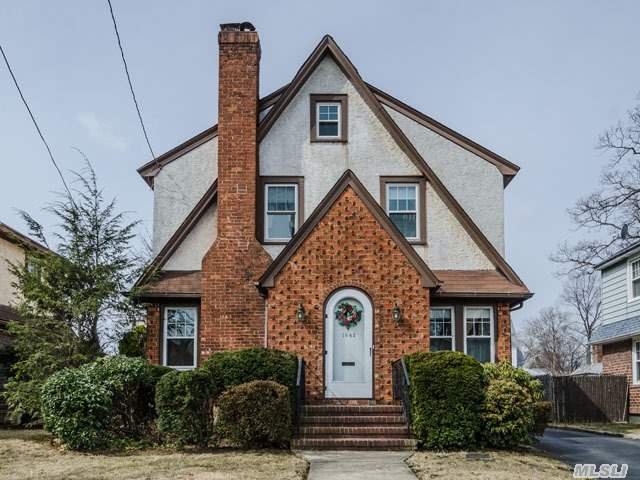 Brand New Gas Heat! Immaculate Home Offers Spacious Lr W/Fpl,  Fdr,  Huge Eik W/Door To Fenced Yard,  3 Nice-Sized Brs,  1 1/2 Updated Baths,  Newer Roof (10 Years),  All Replacement Windows,  New Hot Water Heater & New Dishwasher! This Light-Filled Property Also Boasts A Lovely Brick Patio In The Back,  A Full,  Finished Basement & A Detached Garage. What More Could You Ask For?