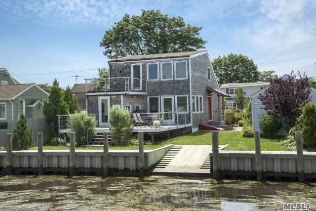 Welcome To The Boathouse. This Waterfront Cottage Has Been Rebuilt From The Ground Up. This All-New Open Style Home Features 3 Beds, 2 Full Bath, Lr/Dr, Private Den Or Bed With Full Bath, 2 Decks With Water Views, Perineal Planted Gardens With Igs, 1 Car Detached Garage, 60 Feet Of New Navy Bulkhead, Boat Ramp, New Cedar Shake And Copper Gutters. Do Not Miss Out...