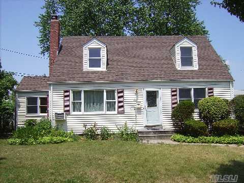 Gas Cooking And Dryer, Wide Line Expanded Cape. Ducts For Cac, Beautiful Fireplace In Living Room, Large Den Or Formal Dining Room, Fenced In Yard, Hardwood Floors, A Quiet Tree Lined Street. Near Pool And School. New Roof, New Siding, New Anderson Windows.