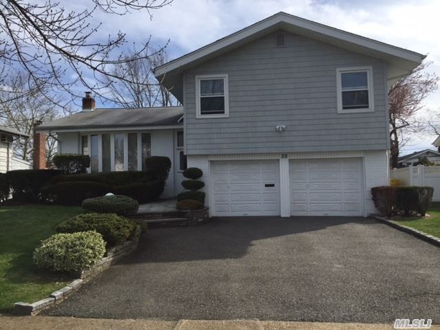 Amazing E. Birchwood Expanded 4 Br 2.5 Bth Hollywood Split Level Home W/ 2 Car Garage. Spacious And Bright Open Layout With Great Details! Wonderful Updated Eat In Kitchen! Master Bdrm W/ Full Bth, Plus 2 Bdrms & New Fam Bath, Fam Room, Fin Basement, Syosset Sd, Robbins Ln Elemen, Sw. Mid. Great Opportunity To Make This Your Special Home. Must See!