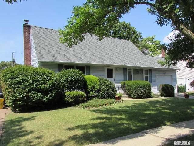 Wonderful Home Located On A Quiet Block With A Great Back Yard. Home Features Brand New Electric Panel[Being Installed 8/18],  New Full Bath,  Hardwood Floors,  An Attached Garage,  Full Basement And An Above Ground Oil Tank. Make This Your New Home.