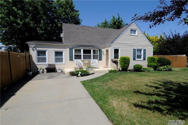 Welcome Home! This Spacious Cape Has An Interchangeable Layout To Accommodate Your Desires! Garage Conversion Can Serve As A Den Or Dining Room! This Home Features Beautiful Hw Flrs, Nice Size Bedrooms, Entry Foyer With Closet, Newer Siding And Roof, 200 Amp Electric, Part Finished Basement And So Much More! Come And See For Yourself! 13 Month Home Warranty Included!