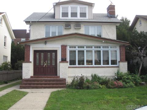 Remarkable Renovated Colonial In The Heart Of Bayside. Wood Floors Throughout. Extra Large Rooms, Living Room W/Fireplace, Formal Dining Room,Finished Basement,Lots Of Closets, Large Finished Attic C/B More Bedrooms Or Master Suite.2 Car Garage And Extra Long Driveway. Convenient To Lirr, Buses, Bell Blvd, Shopping, Schools And Houses Of Worship.