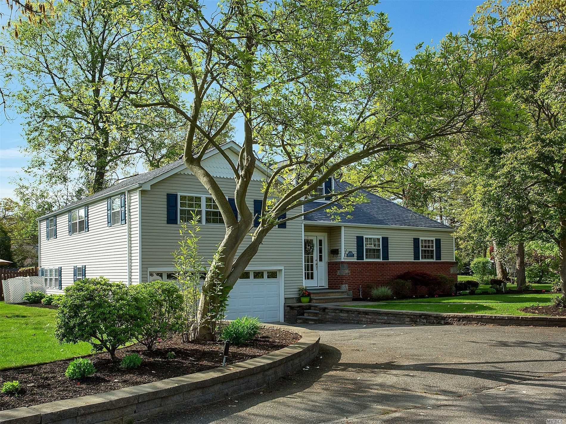 Enjoy Viewing This Renovated 4Bdrm, 2 Bth Custom Colonial. Huge Kitchen W High End Appliances. Open Layout . Beautiful Wood Flrs.  This Home Is Situated On A Beautiful Piece Of Property. The Back Yard Is Very Park Like And Great For Entertaining. This Property Comes With Associated Docking.