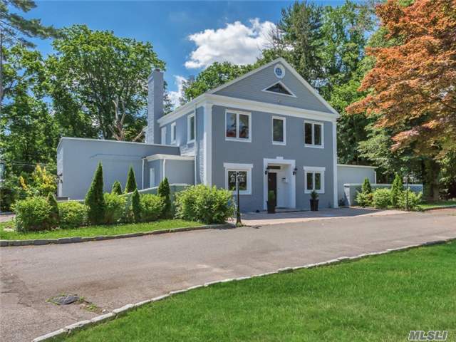 Circular Driveway Leads To Stately Center Hall Brick Colonial. Large Entry Hall Is Followed By A Large, Bright And Sunny Entertaining Living Room With Fireplace And Wet Bar. Formal Dining Room With Fireplace. An Eat-In Granite Kitchen With Stainless Steel Appliances And French Doors That Lead To The Patio Area. Finished Attic Space With Windows. New Cesspool