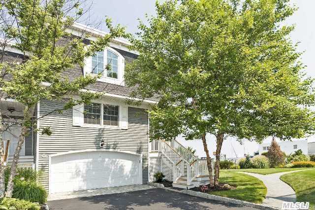 Spectacular, Chic,  Stunning,  Elegant.These Are Only A Few Words That Describe This 3 Bedroom, 3.5 Bathroom Waterfront Townhome On 300' Wide River And Views Of Great South Bay, Bridges And The Fire Island Lighthouse.  Wake Up And Enjoy The Beautiful Sunrise From The Deck Off The Great Room And The Master Bedroom.Dock Your Boat At Deeded 40'Boat Slip! Taxes Boat Slip $1, 833.34