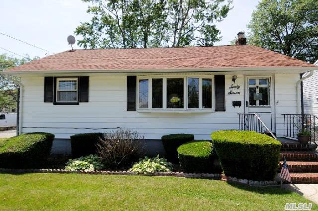 This Lovely Expanded Three Bedroom Ranch Features Extended Eat In Kitchen-Clean As A Whistle-Finished Basement-Updated Roof And Windows-Both Oil And Gas In House-Convenient To All.