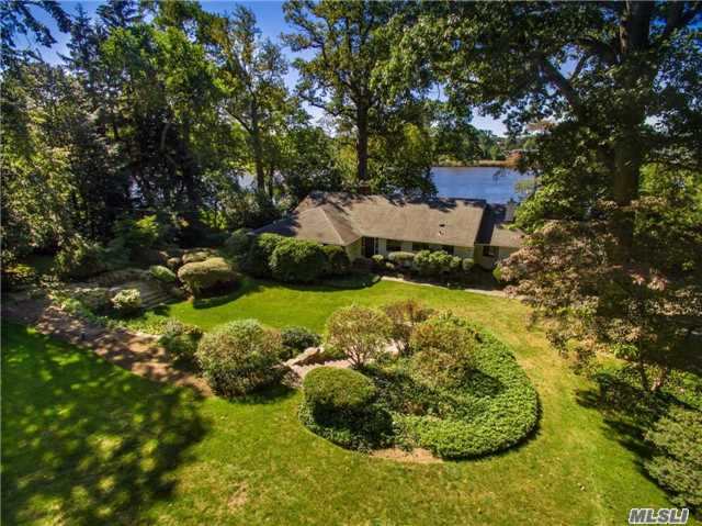 Exceptionally Unique Waterfront Property In Plandome Mills On Leeds Pond Is The Perfect Setting For This Residence That Offers Unparalleled Views. Well Maintained Private Grounds With Lush Landscaping, Set With Fountain Pools And Pristine Plantings On Over An Acre Of Land. Minutes Walk From Plandome Train & Country Club. This Home Is A Must See For The Discerning Buyer!