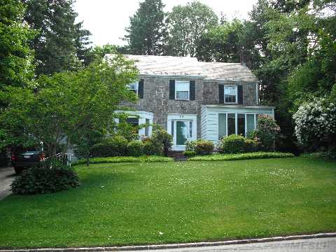 This Spacious Stone Center Hall Colonial With Slate Roof Boasts Architectural Details Thru-Out And Enjoys An Ideal Location In The Prestigious Waterfront Community Of Harbor Hills With Its Own Pool & Tennis Clubs. 