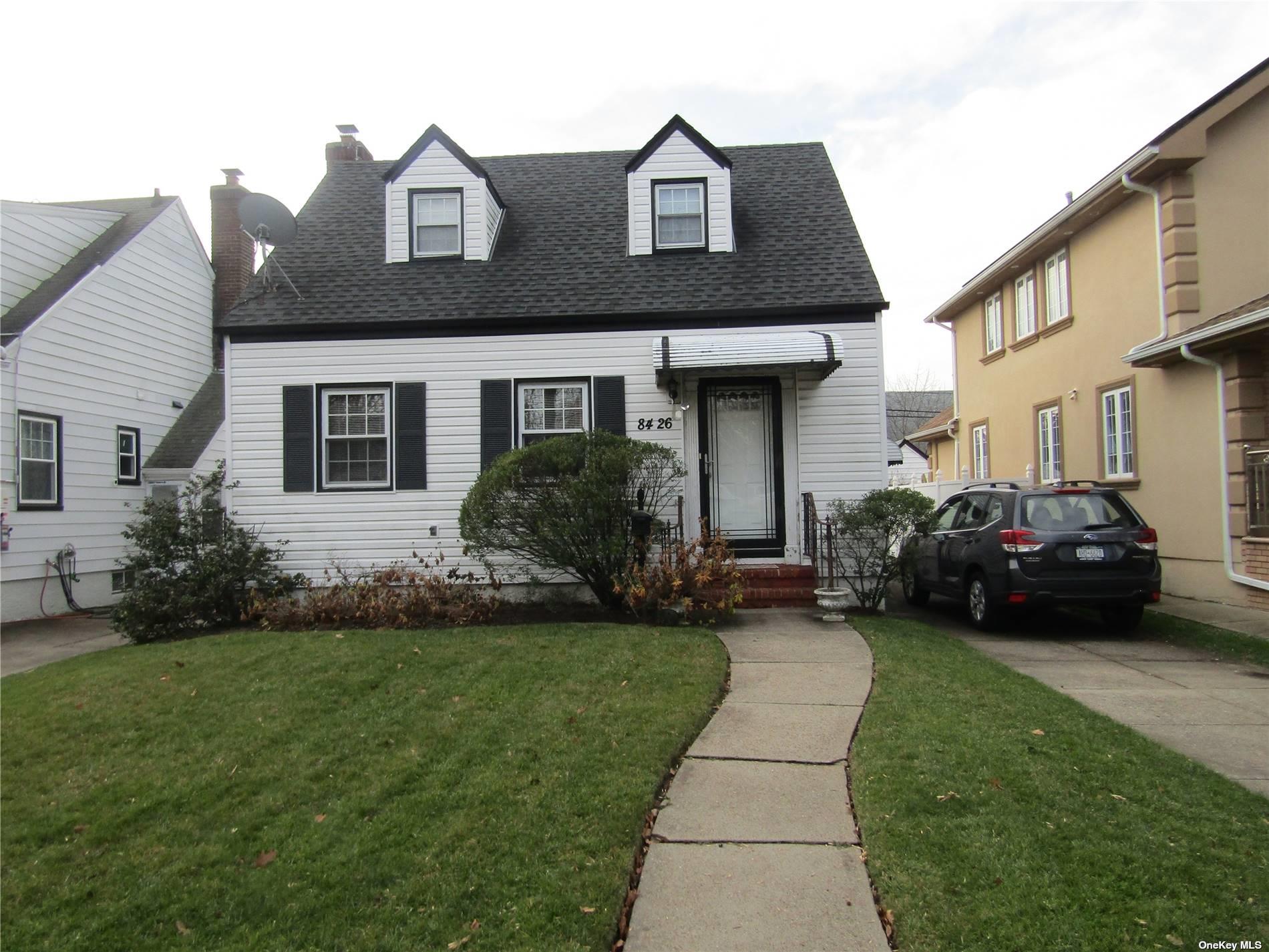 Single Family in Bellerose - 249th  Queens, NY 11426