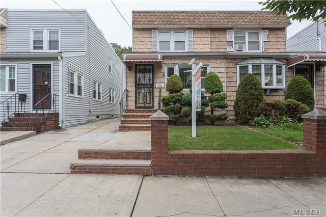 Semi-Detached Colonial In Prime Bayside Area Features Living Room, Formal Dining Room, Eat In Kitchen, All New Oak Floors, 3 Bedrooms, 1 Full Bath, Vinyl Windows, Partially Finished Basement With Commode, 2 Zone Gas Heat, Parking In Rear. Near Schools, Shops, & Buses. Ps 159 & Is 025