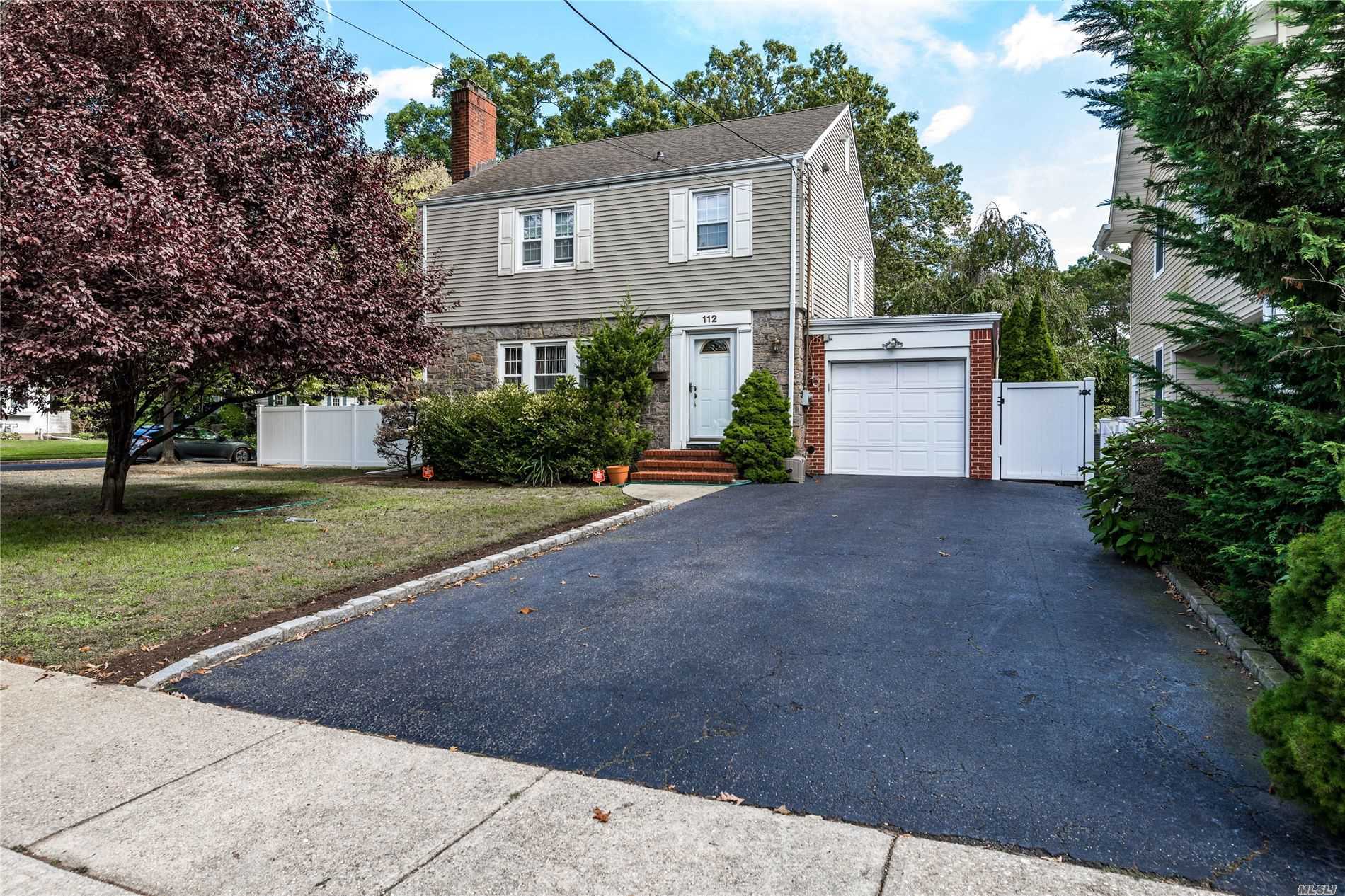 3 Bedroom Side Hall Colonial Set On Oversized Property (75 x 100). House Features Large Living Room With Wood burning Fireplace, Formal Dining Room, Eat-In Kitchen, 3 Large Bedrooms, New Bathrooms, New Roof, CAC, New Gas Burner, Gas HWH, And More.