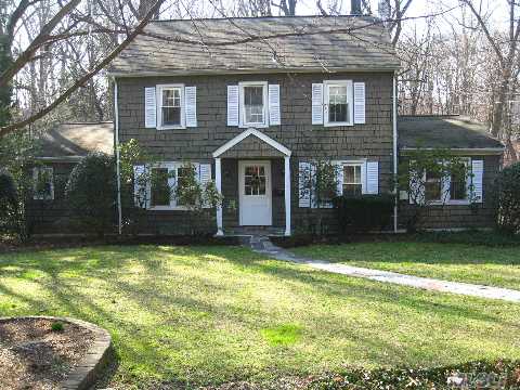 Traditional Farmhouse Colonial On Park-Like 1/2 Acre In The Heart Of Baxter Estates! Gracious Center Entry Leads To Lr/Fpl, Bright And Sunny Fdr, 1st Fl. Guest Suite/Bath, Country Eik Opens To Fabulous Oversized Deck Overlooking Running Brook. Large Rooms Throughout. Att. 4 Car. Whole House Generator. Walk Town Rr, Much More!!! 