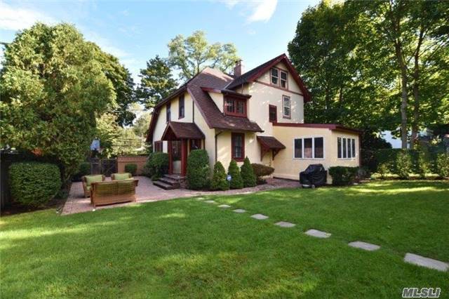 Superb Sun Drenched Mint Colonial/Tudor Featuring:Large Eh, L/R W.F/P, Fdr, Eik W. Wainscot Ceiling, Newer S/S Stove, 4 B/Rs , 2.5 Bths, Full Fin. Attic, F/Fin. Bas, Det. 2Car Garage, 9300 Sq. Ft. Lot.,  Gas Heat, Cac, , Beautilful Private Yard W. Brk. Pavers. Close To All. Old World Charm With Modern Amenities.