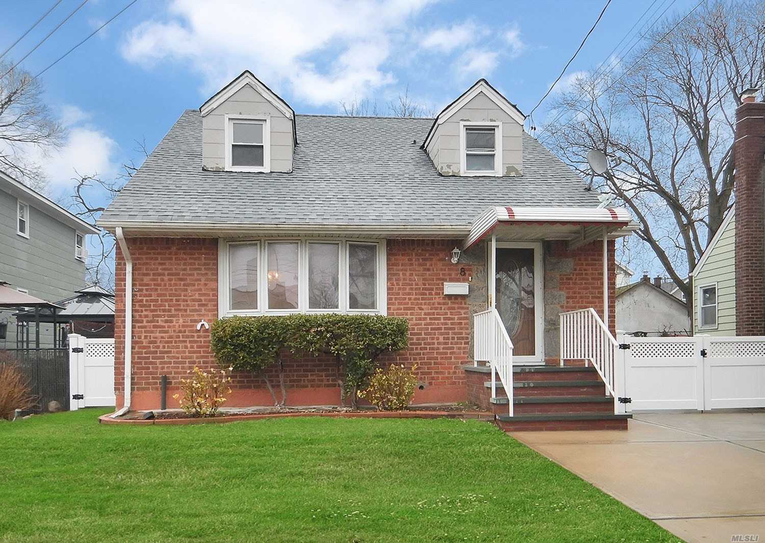 Beautiful Cape With 4 Bedrooms (Master Could Be On 1st Or 2nd Floor). Spacious Living Room Open To Dining Room. Full Basement With Separate Entrance. Patio With Fenced In Back Yard. Close To All Transportation, Schools And Shopping. Famed New Hyde Park/Garden City Park School District. 1.5 Car Detached Garage. Pvt. Off Street Parking For 2 Cars. Easy Commute - 30 Minute Train Ride To Manhattan. Walking Distance From The Merillon Ave. Station. A Great Place To Call Home