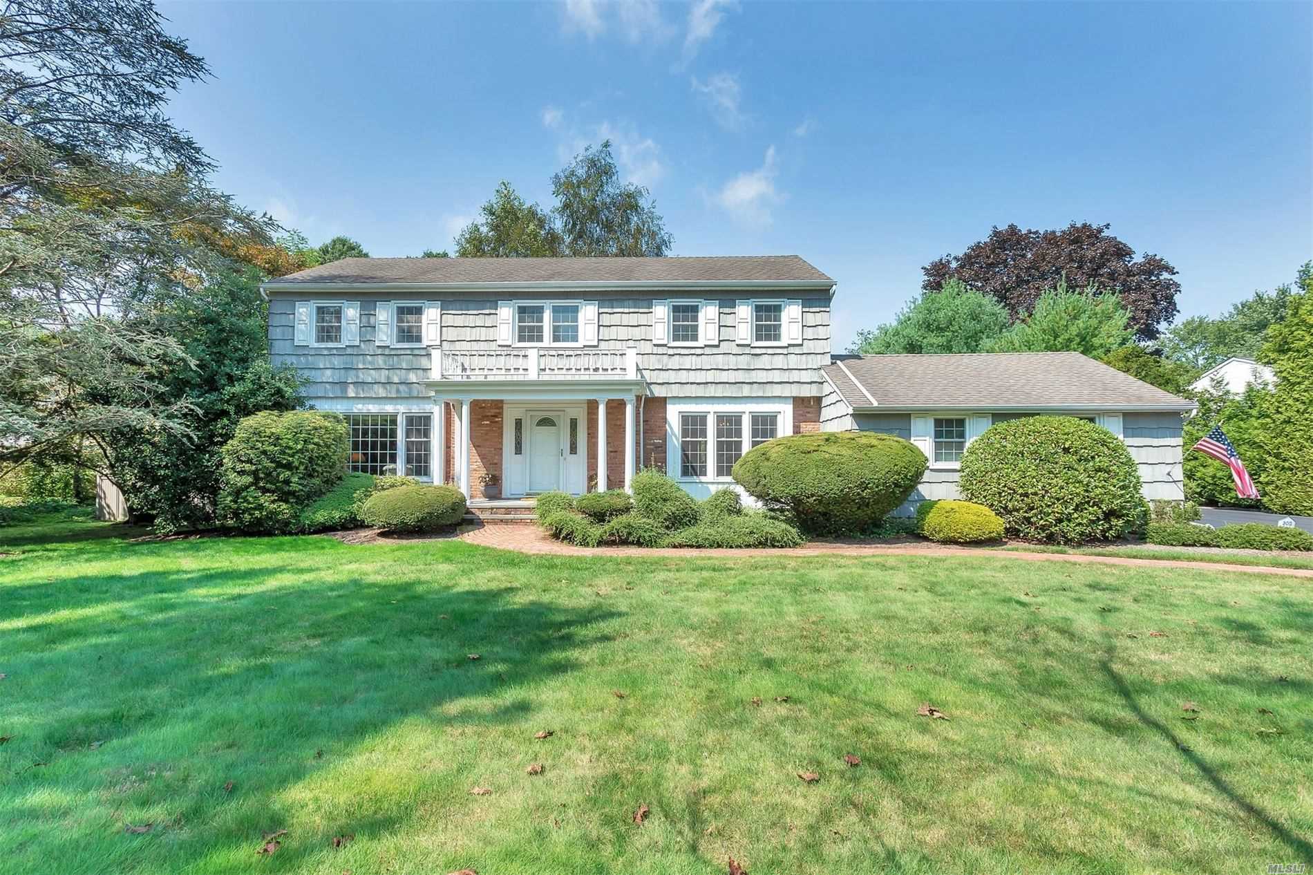 Impeccably Decorated, Designed & Lovingly maintained Harborfields SD Colonial with Picturesque 20x40ft Heated Pool with Armortec Patio surrounded by just shy Flat Acre Back Yard Haven.Open Plan Living with Classic Quality Finishes & Gleaming Hardwood Floors throughout (even below soft sumptuous spotless carpets). Quaker Cabinets+Granite, Eat-in-Kitchen High End Appliances Gas Wolf Burner/Stove, Bosch Drawer Dishwashers.French Doors to 30x18ft Entertainers Deck from EIK & Family Room w/gas FPL.