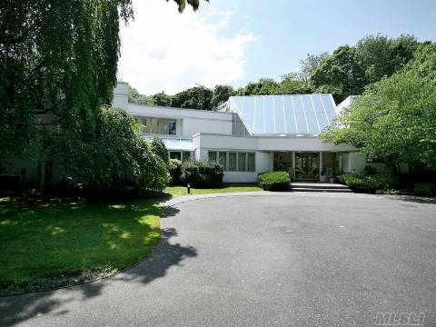 Spectacular Modern Home With Walls Of Glass Situated At The End Of A Quiet, Magnificent Cul-De-Sac.  Enjoy This Two Acre Paradise With An Indoor & Outdoor Pool, Tennis Court And Cabana. Jericho Sd