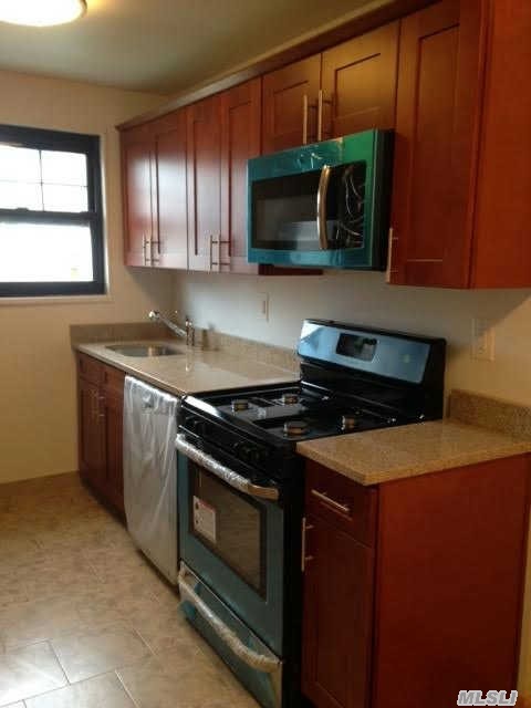 No Board Approval Required! Just Unpack And Move In.  Perfect One Bedroom,  Bright Corner Unit.  Dogs Are Welcome. All Utilities Included. Custom Kitchen,  Attic Storage,  Stunning New Bathroom.  Investor Friendly!