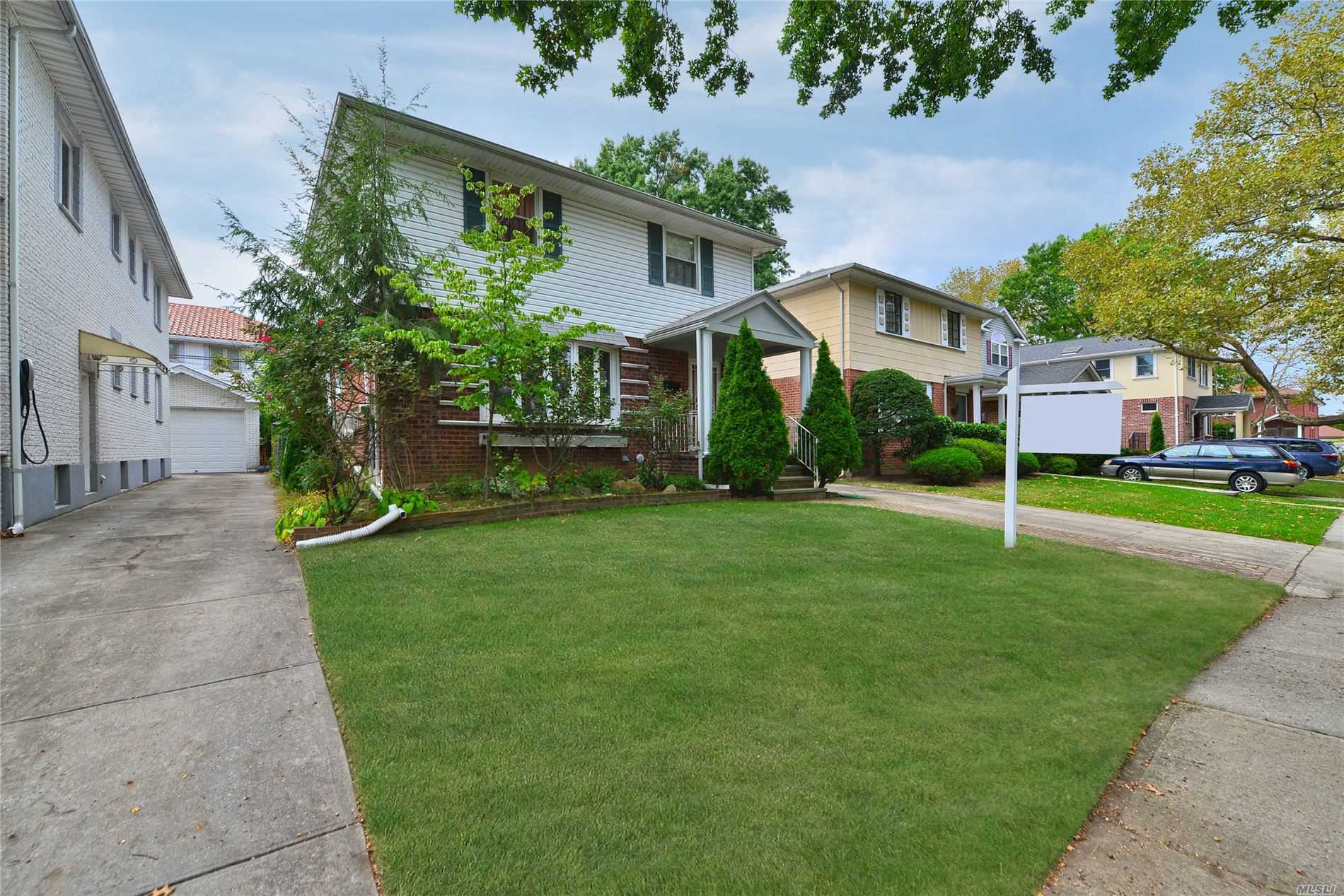 Rare find- bright, spacious and large 4 bedroom, 2.5 bath colonial located on a beautiful block in Fresh Meadows. Many upgrades include renovated kitchen & bathrooms. Convenient to all shopping, transportation, and easy access to LIE. School District 26, P.S. 162, M.S. 158, Francis Lewis H.S.