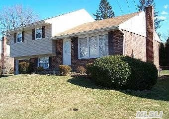 Rose Wood Split Level In The Prime North Hicksville Location. Quite Tree Lined Street. Perfect Mid Block Location. Private Fenced Rear Yard. New Roof,  Vinyl Siding,  Vinyl Windows,  Front Brick Walk,  Black Top Driveway,  Heating System. Natural Gas In House.