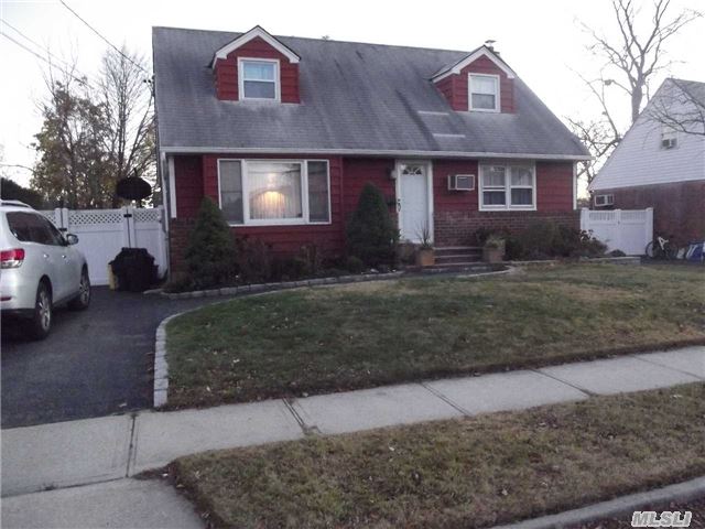 West Farmingdale Cape With Open Floor Plan! Gas Heat/Gas Cooking Living Room-Formal Dining Room-Eat In Kitchen-4 Bedrooms- Upstairs 2 Over Sized Bedrooms All Redone! New Bathroom-New 200 Amp Service-Finished Basement With Tiled Floor! Some New Windows-Beautiful Over Sized Yard With Pvc Fence-Convenient To All-Woodward Parkway Schools- Hurry!