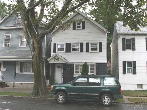 Clean Three Bedroom Colonial With Two More Finished Rooms In The Attic. Nice Backyard With A Brick Paver Patio.