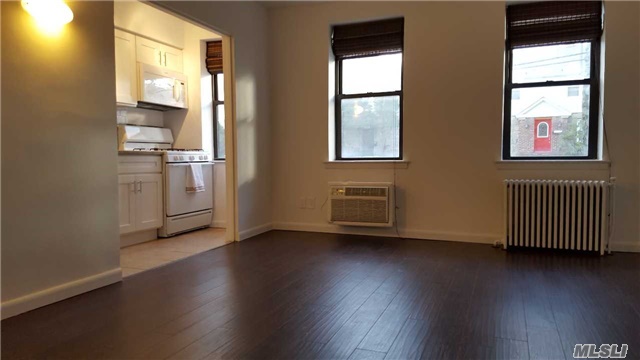 Beautiful Newly Renovated 2 Room Studio Is Equipped With Hardwood Floors And A Full Kitchen.