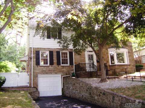 Traditional C/H Colonial Near Town On Lirr + Transportation.  Top Of The Line Kitchen Open To Lg Den And Private Property. Totally Renovated