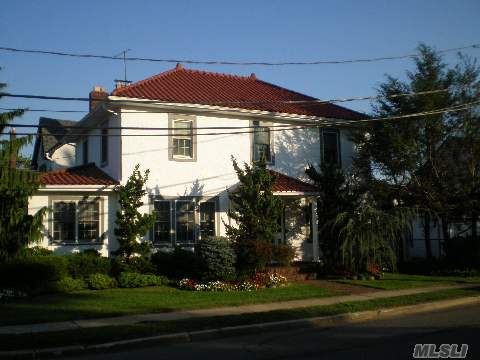 Majestic Colonial Features Terra Cotta Roof, Hardwd Flrs & Fabulous Curb Appeal. Desirable S. Lynbrook Loc On Quiet Res Street. Central Air, Igs, Large Open Living Space Incs. Ef, Den, Lr W/Fplc, Fdr, Spacious Eik & Nanny Rm/Office.  Master Has Private Bath & Large Closets. Fin Bsmt, Det Garage. Prof Landscaped. New Windows. Jacuzzi Tub. Taxes Do Not Reflect Star $1318.58.