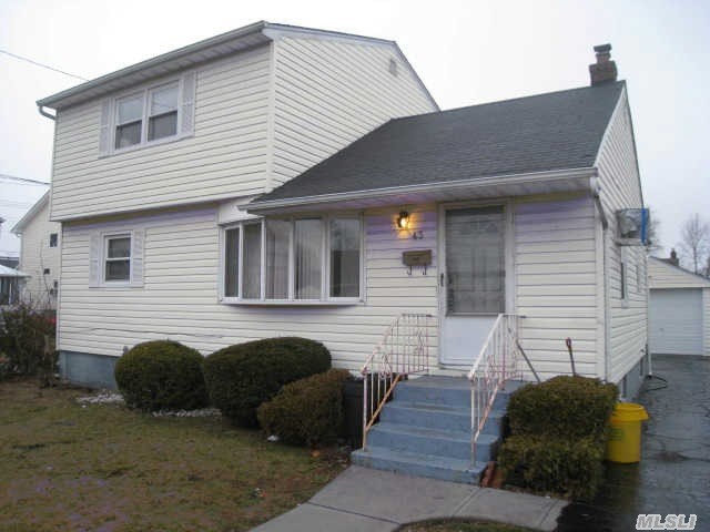 Cape Home Ready For New Family. Lr/Dr,  Eat In Kitchen,  4 Bedrooms,  2 Full Baths,  & Full Finished Basement. Garage & Deck. 1 A/C Wall Unit.