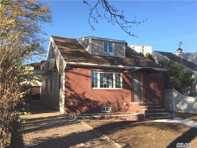 Completely Renovated 1 Family Home. 4 Bedrooms, 4 Full Baths, 3 Separate Zone Heating & Central Air. Finished Bsmt With Sep Entrance, Building Size 26X46, New Hard Wood Floor, All New Window And Many More.1 Block From Bay Terrace Shopping Mall, Buses Q28, Qm20, Q13