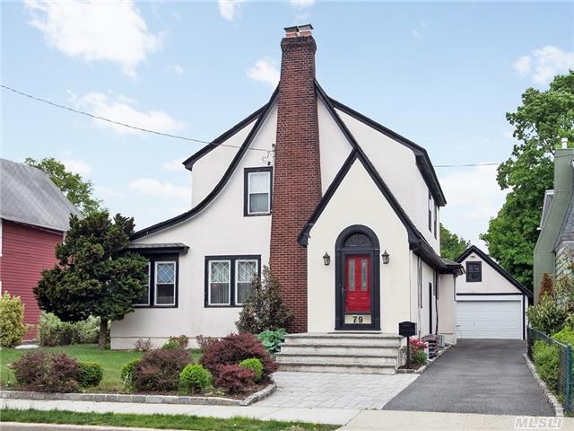 Stunning 3 Br & 1.5 Bath Tudor Home W/ Old World Charm & W/All The Bells And Whistles! This Updated Home Boasts Gleaming Hw Floors, New Roof, Gorgeous Eik W/Quartz Silestone Counter Tops W/ Top Of The Line Appliances & Vaulted Ceiling W/Skylight W/Rain Sensor.Fdr, Trex Decking & Pvt Yard, 2 Car Det Gar W/Huge Loft, Lr W/Fplce, Den, Quaint Enc Porch! Sd#14! Great Location!
