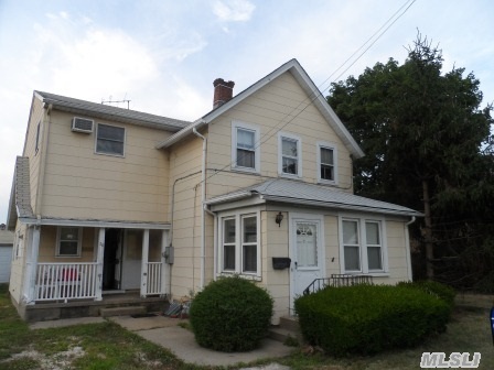 A Colonial In Need Of Updates And Repairs  . Walking Distance To  L.I.R.R And Bethpage Shopping District .