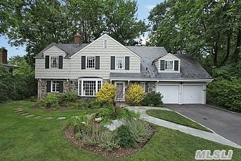 Stately Munsey Park Colonial With 6 Brs,  3.5 Baths Overlooking Polliwog Pong