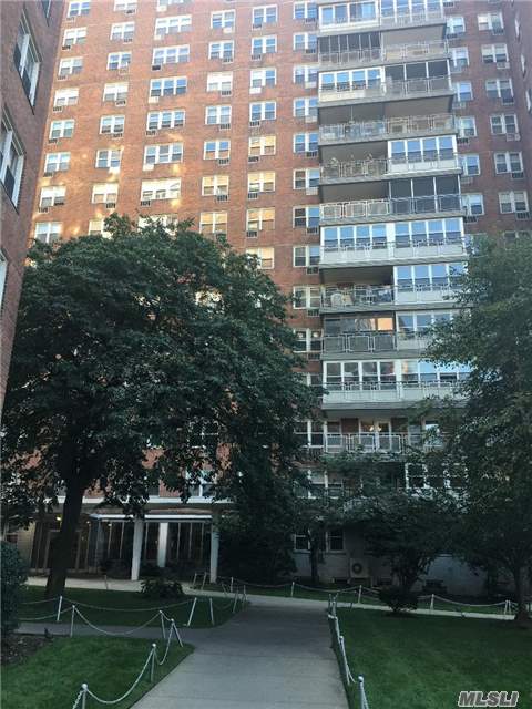 Large 2Brs/2Bath Co-Op In Downtown Of Flushing, Approximately 1000Sqft, Maintain Very Well High-Rise Building, Excellent Location.