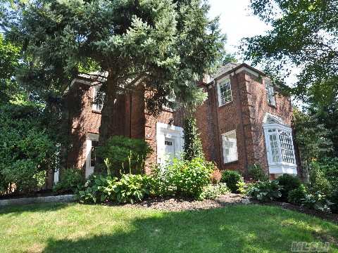 Unique Brick French Normandy Colonial Situated On A High Elevation Corner Plot In South Strathmore. The Manicured Landscaping And Architectural Details Offer Tremendous Curb Appeal & Views!This Hidden Suburban Beauty Boasts Modern & Comfortable Elegance;New Kitchen,Crafted Moldings, Limestone Crafted Mantel,Red Oak Floors,Quality Doors/Knobs Cac,Alarm,New Electr.(Att.List)