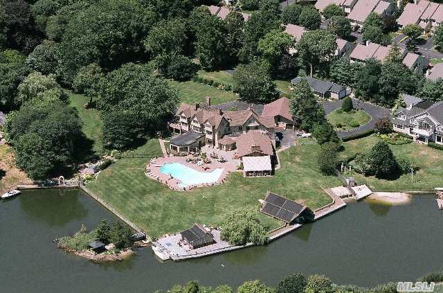Be The King Of Your Very Own Castle On 3.1 Acres With 350' Bulkhead & Boat House. Detatched 5 Car Garage W/ Loft,  Pool House,  And Small Private Island. This Is Your Opportunity To Own A Piece Of Local History. The Famed Awixa Castle Awaits You !