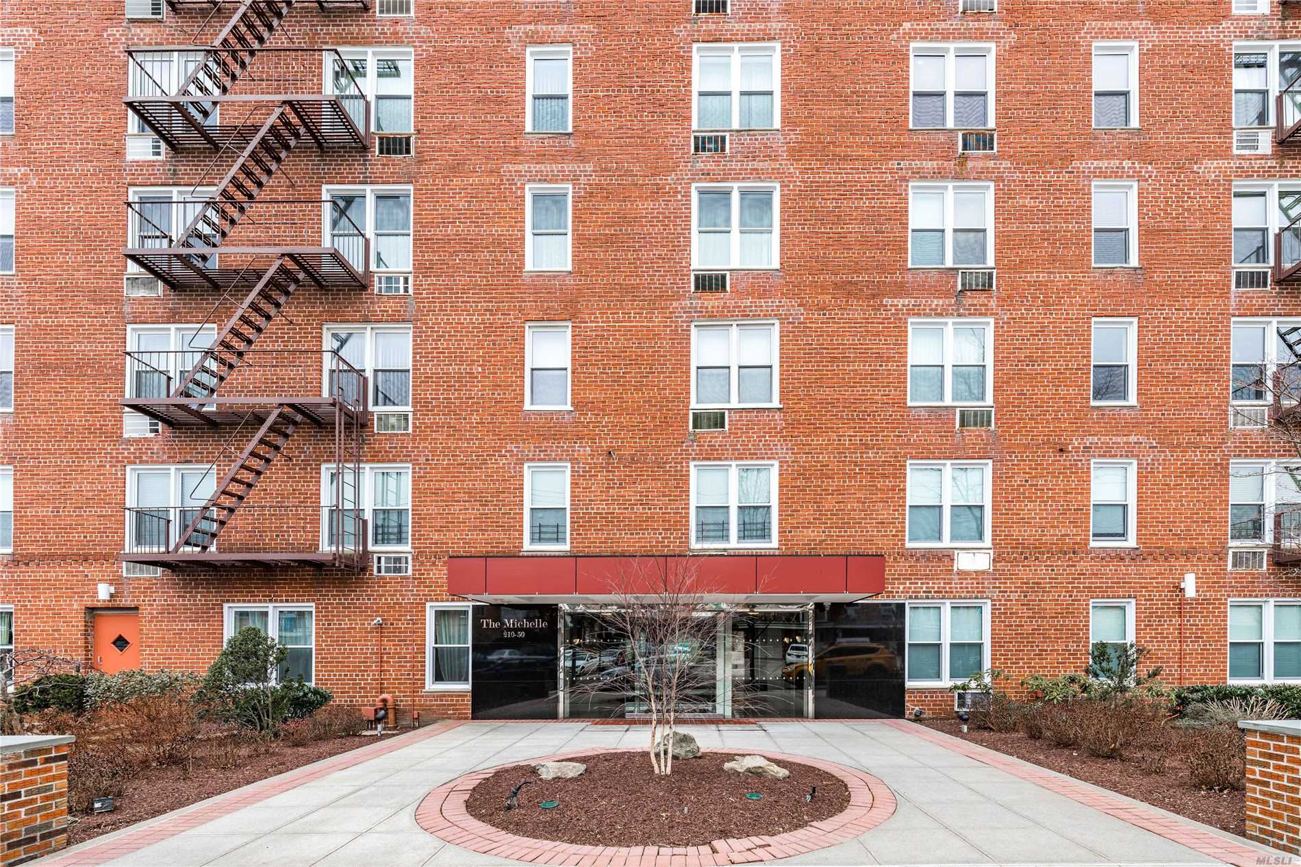 Beautiful spacious true 2BR Co-op apartment. Great layout and bright sunny corner with 3 exposures. Modern EIK and bath. Shows well. Convenient to LIRR, Bell Blvd, 3 blocks to shops and restaurants. New windows, new elevator.