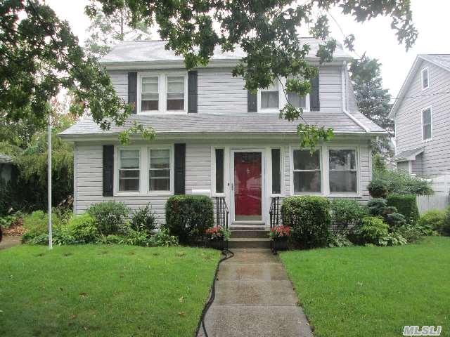 Commuters Dream! Outstanding Dutch Colonial Home Located In The Desirable Park Section. Enclosed Front & Back Porch,  Granite Kitchen,  3 Br,  1.5 Bath,  And An Unusually Large Fdr & Full Spacious Unfinished Basement & Attic. Close To All-Short Distance To The L.I.R.R,  Dining,  Major Roadways/Highways & Shopping. A Must See!!!