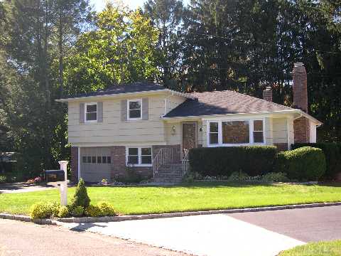 Beautifully Renovated 4 Brms Split On Private Cul De Sac. A Magnificent Flow Throughout Main Level W/New Eik That Leads On To A New Deck Backing The Muttontown Preserve. Lr W/Frpl, New Appliances, New Windows & Doors, Gleaming Hdwd Flrs, Full Finished Basement W/New Carpeting. Separate Laundry W/New Washer,Dryer &New Hot Water Heater.Beautiful Grounds,Great Loc.Low Taxes