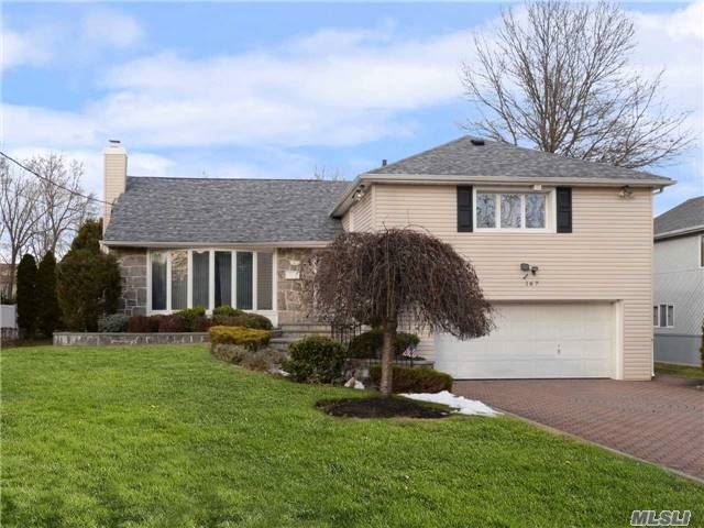 Beautiful Split In Manhasset Hills, 3 Bedroom(Master With Hugh Walk-In Closet&Full Bath), 1 Family Room, Formal Dining Room, Open Kitchen, 2.5 Bathrooms.Finished Basement As Office/Entertaining Room, 2 Car Garage With Spacious Nicolock Driveway, Flat Backyard With Exquisite Landscaping&Stone Patio With Canopy. All Information Deemed Accurate However Should Be Independent Verified