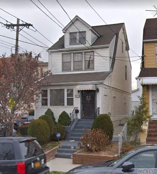 Great Corner Property, Solid House Needs Updating, Huge 2 Car Garage. Great Location 1 Block From Ps 163 Elementary School, Kissena Park, Bus Transportation, 4 Blocks From Queens College.