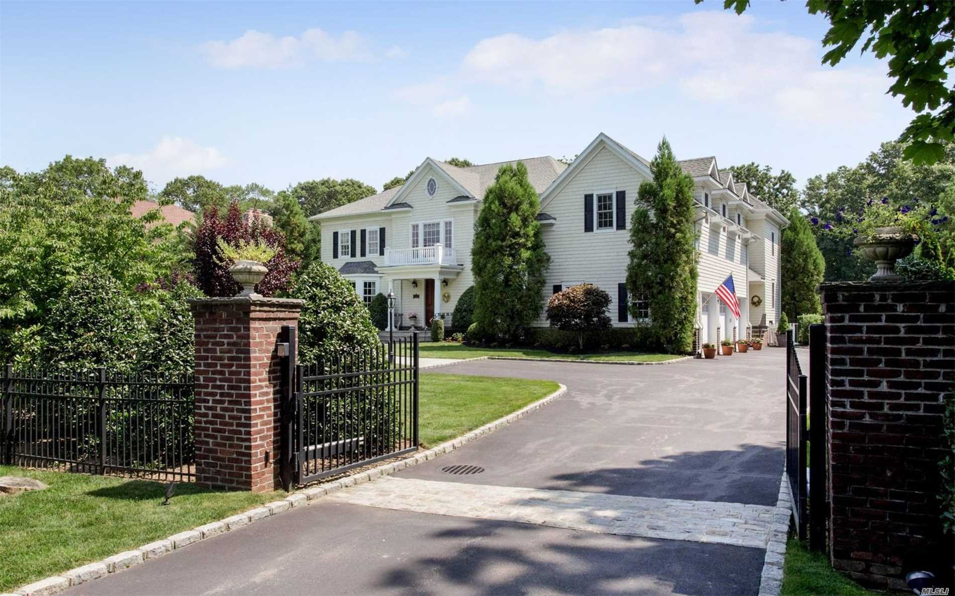 Gracious Ch Colonial, Gated & Privately Set Back In No. Syosset. Built In 2007, 5200Sq&rsquo;, With 9&rsquo; Ceilings. Lg Crown Moldings, Open Flr Plan, Hw Flrs. Walk-In Closets. Great Center Island Kitchen W/French Doors To Pool. Double Door Entry Master Suite W/Gas Fp. Traditional Flair. 4 Brs + Office/Maid&rsquo;s Rm + 2nd Flr Media Room. 1 Acre Landscaped Setting W/Salt Water Heated Pool. Private & Wonderful!