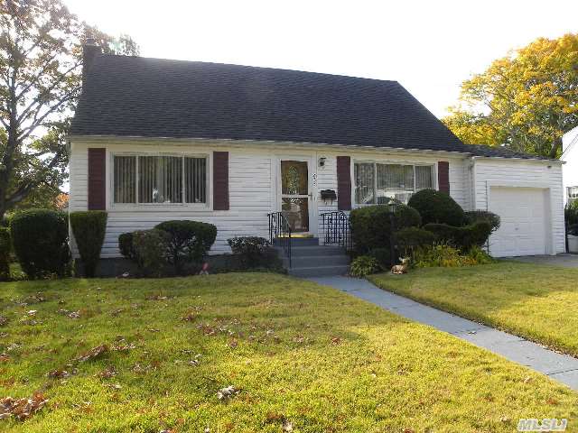 Architectural Roof,  Peerless Heater,  Vinyl Siding,  New Burner,  Kitchen Pine Cabinets With Granite Counter,  All Five-Years Old. Also,  Steel Stack(Insert) In Chimney.There Is An Enclosed Room Off Kitchen,  Hardwood Floors Under The Carpet. Beautiful Property 72X100. Plainedge Schools Close To Shopping And Parkway.