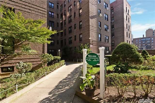 Beautiful Co-Op Building Located In The Heart Of Flushing. Maintenance Included All Utilities. Easy Access To Transportation And Convenient To All.