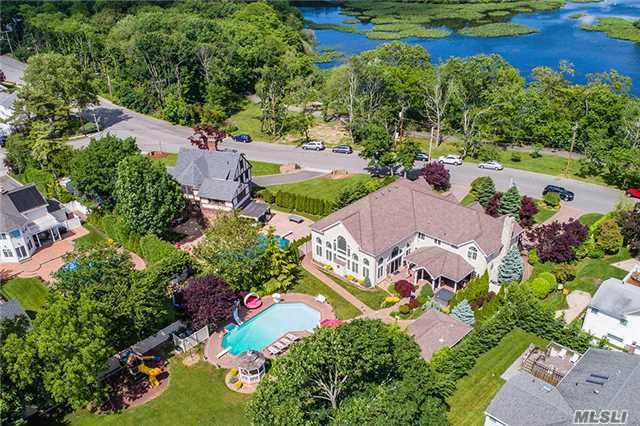 This Palatial 5800Sqft Colonial Is A Lifestyle Of Luxury Which Is Situated On 100X329 Property W/A Resort Backyard Setting W/Htd Ig Pool*Cabana*Outdoor Kitchen*Veranda & A Basketball Court. An Opulent Mbr Suite Is Yours To Enjoy Overlooking The Lake*A Spectacular Sundrenched Entertainment Rm W/Soaring Ceilings & Gas Fireplace Are Enviting To You & Your Family. Magnificent!